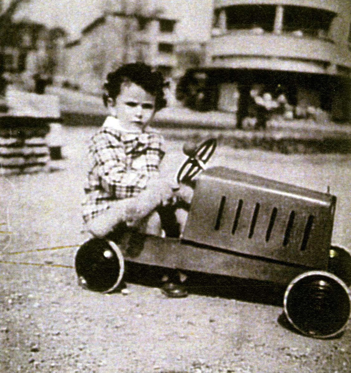Nicole in go cart circa 1940